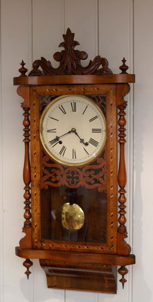 A Decorative and Ornate Example of a Mid Victorian Anglo American Wall Clock
